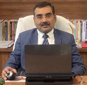 Dr. Anil M. Bisen
